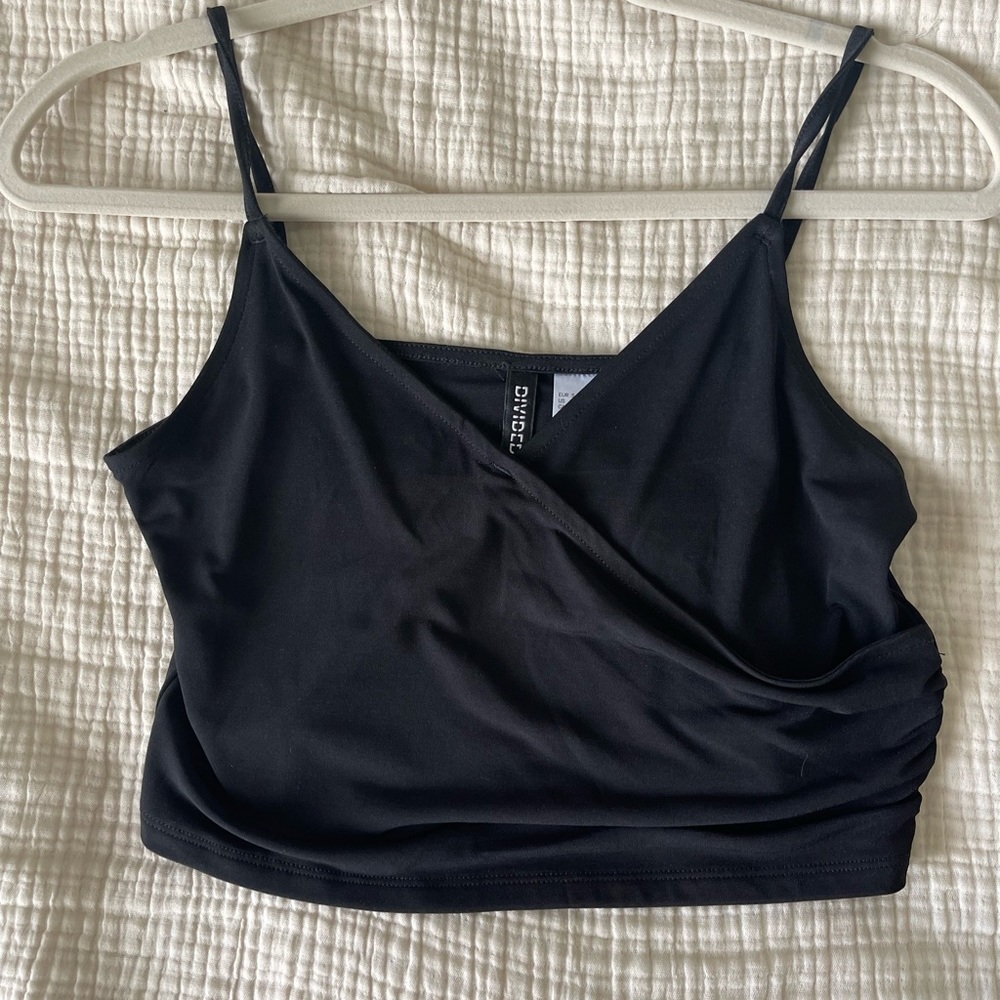 Black cross over crop top from H&M, size US 2, never worn with tags